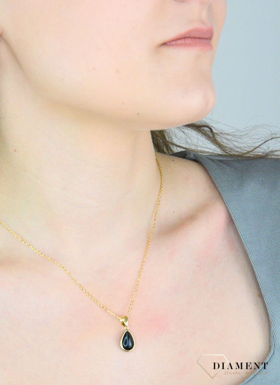 Zawieszka złota łezka onyks pr 585, E0NUE14059 ONX Wisiorek został wykonany z wysokiej jakości złota próby 585. Złoto to jeden z najpopularniejszych kruszców, cenione przez kobiety na całym świecie1.jpg